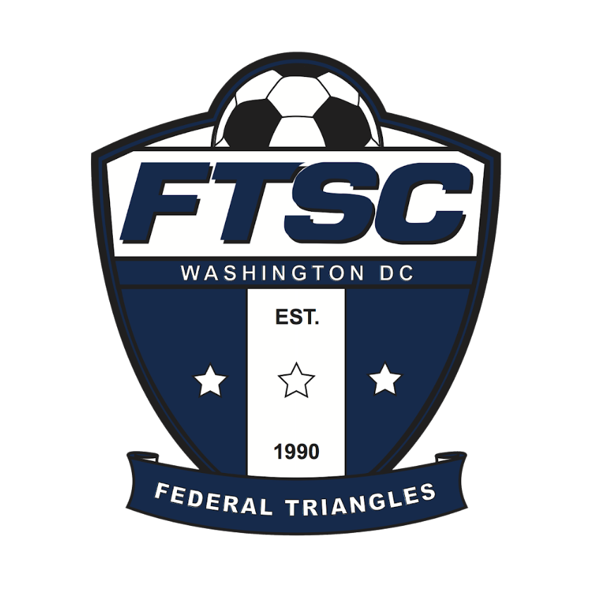 Triangle Federals Soccer Club logo with a dark blue crest with a soccer ball peaking out halfway at the top behind the initials "FTSC."  The words "Washington DC" and "EST. 1990" three stars over 3 vertial blue and white stripes wrapped at the bottom in a banner that says "federal triangles."
