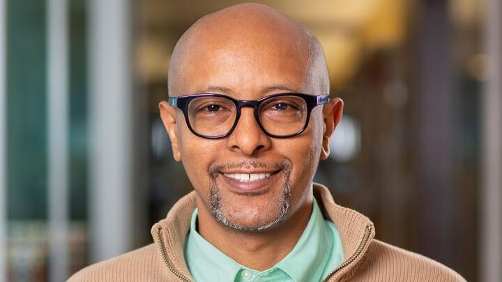 Smiling man with glasses