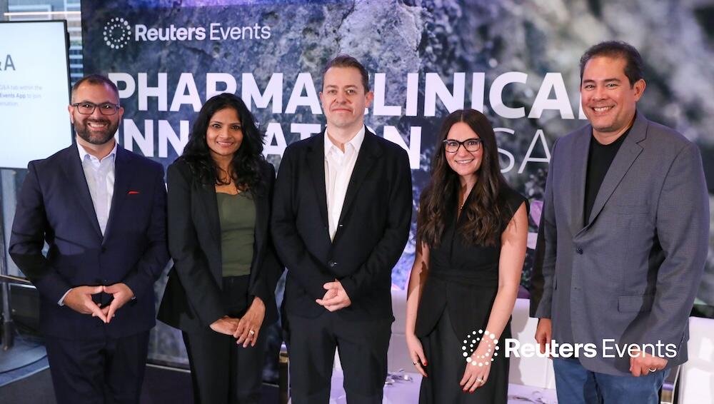 A group of people posing for a photo at our Customer Engagement USA show