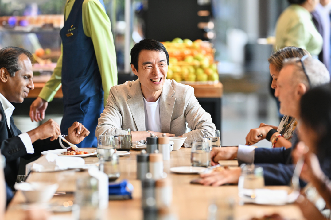 Attendees share conversation over lunch during Reuters NEXT Asia.