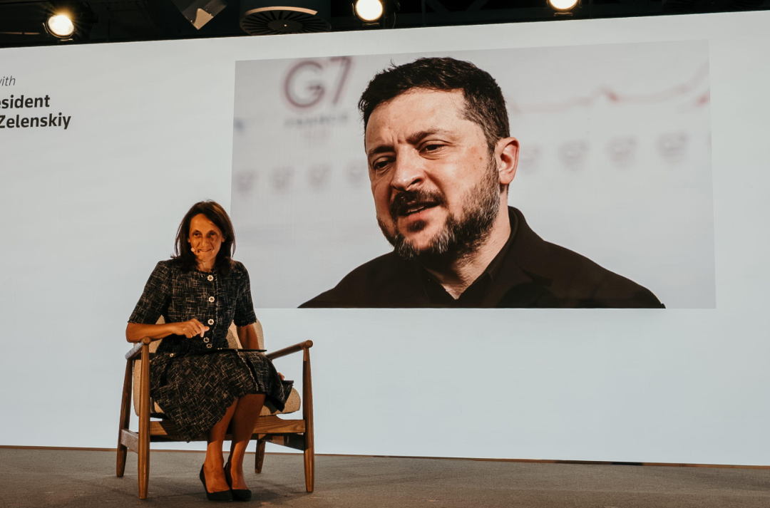 Reuters Editor-in-Chief Alessandra Galloni interviews Ukrainian President Volodymyr Zelenskiy by video link on stage.