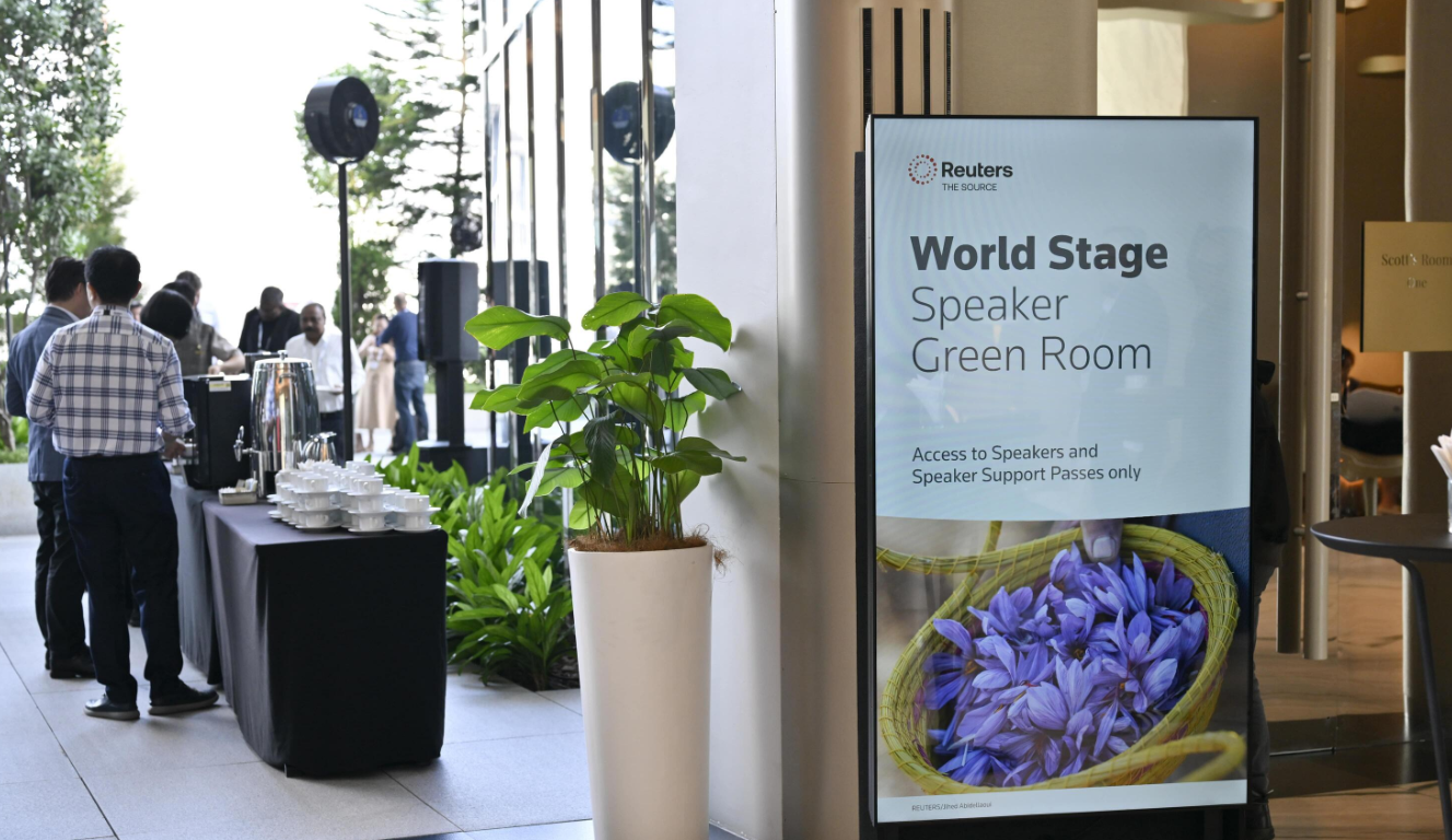Sign reading "World Stage Speaker Green Room" at Reuters NEXT.