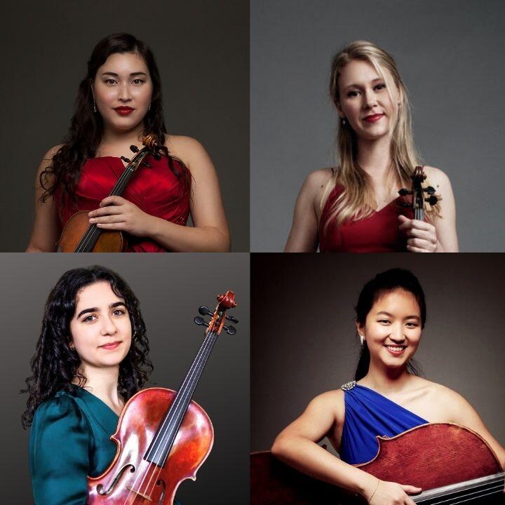 Photo of the members of the Ulysses Quartet standing on a staircase holding instruments. Three woman (2 Asian, 1 White) wear blue gowns. 1 white man wears a suit.