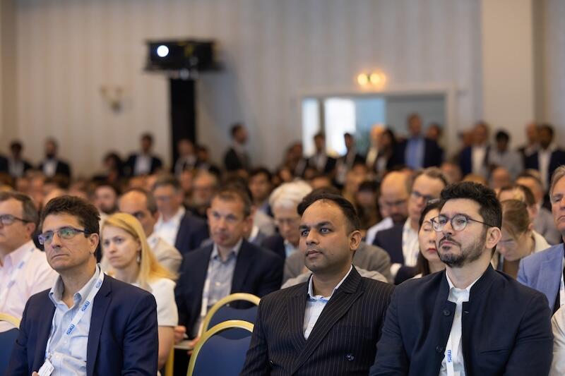 A room full of attendees at a Reuters Event conference