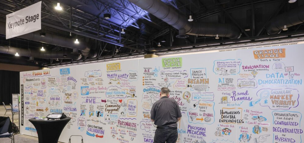 Large illustrated ideas wall under a "Keynote Stage" banner shows sketchnotes on topics like data democratization, health equity, and precision medicine.