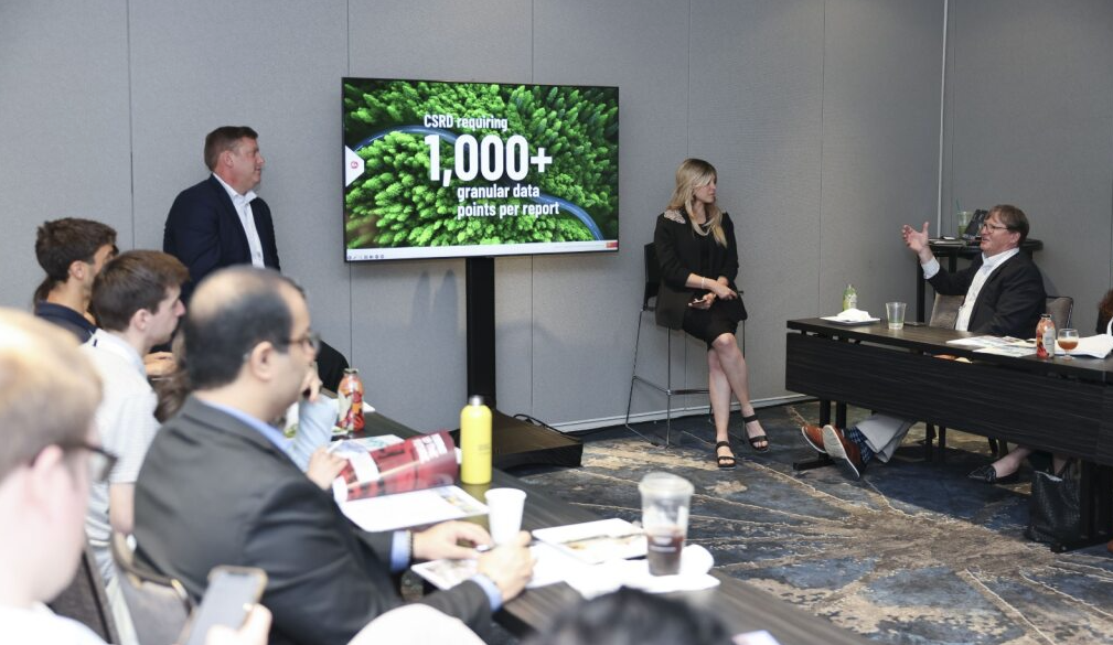 Panel discussion at Responsible Business USA conference with audience; slide reads "CSRD requiring 1,000+ granular data points per report."