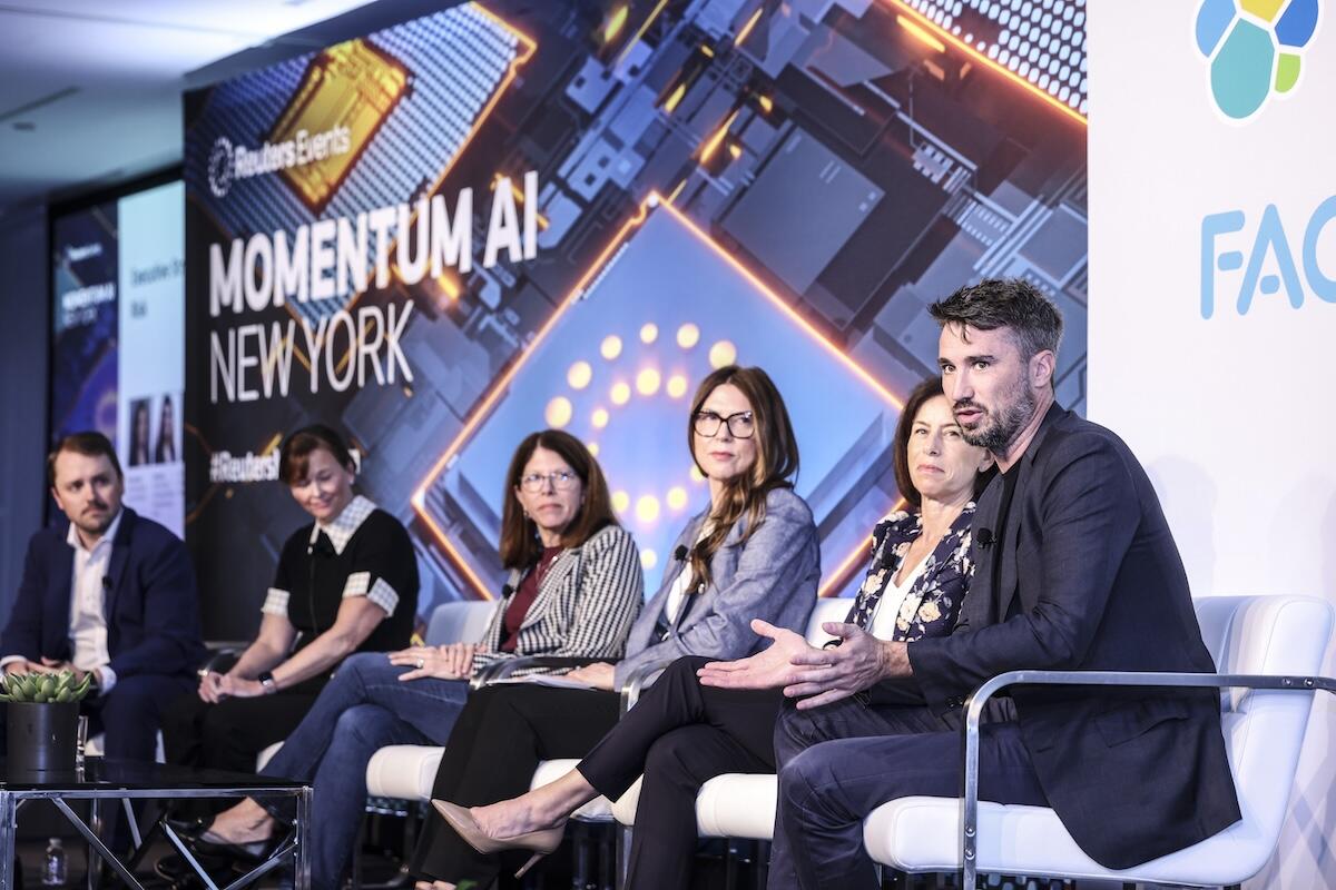 6 people on stage at Momentum AI New York