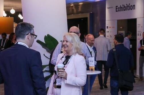 A photo of various groups of people at the Supply Chain USA show