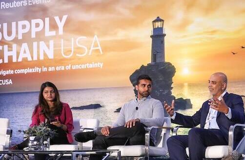 4 speakers on stage talking at the Supply Chain USA show