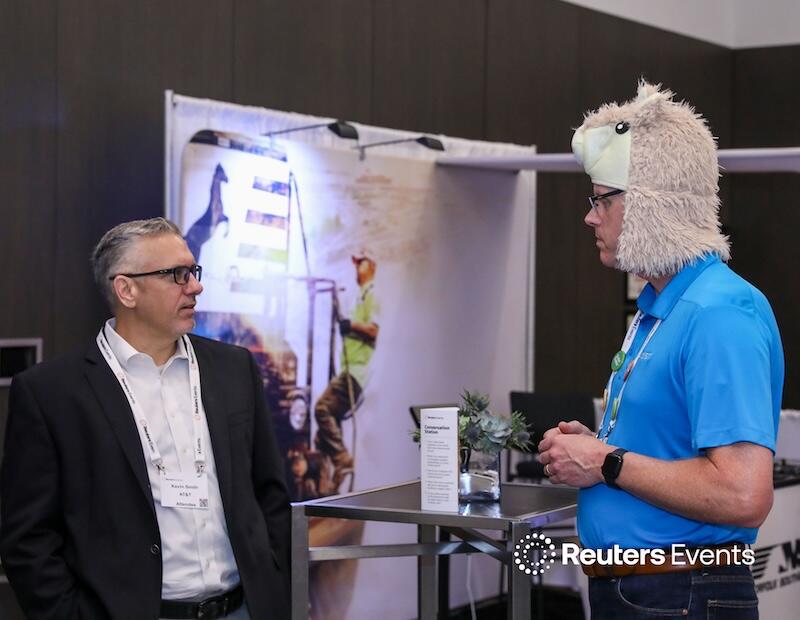 Two people talking at the Supply Chain USA show
