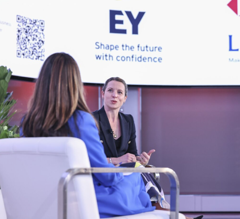 2 speakers onstage at Reuters NEXT during a fireside chat