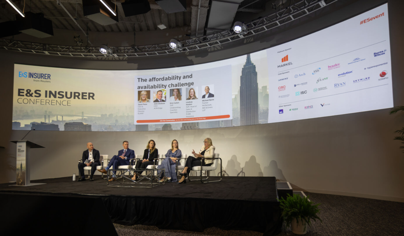 Panel on stage discussing affordability and availability at the E&S Insurer Conference.