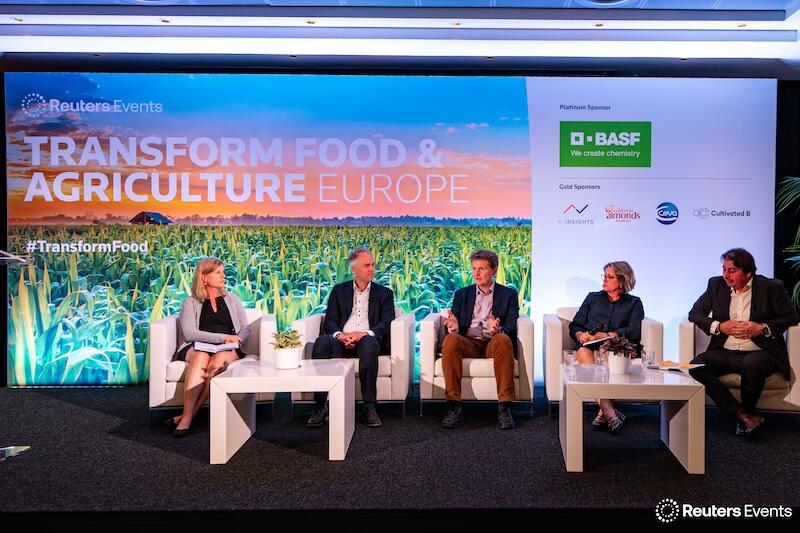A group of presenters on stage sitting down at a Transform Food & Agriculture event