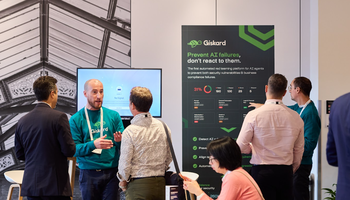 Attendees discussing an AI product with its vendor at an exhibitor booth 