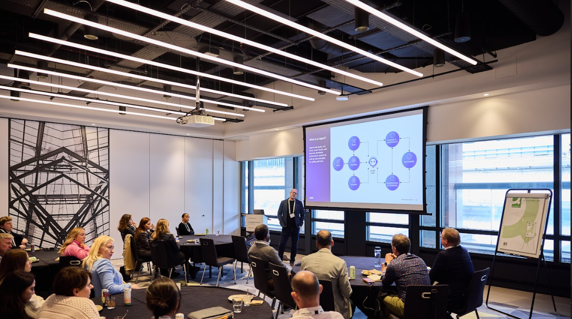 Attendees listening to a presentation in a breakout room at the Momentum AI London conference.