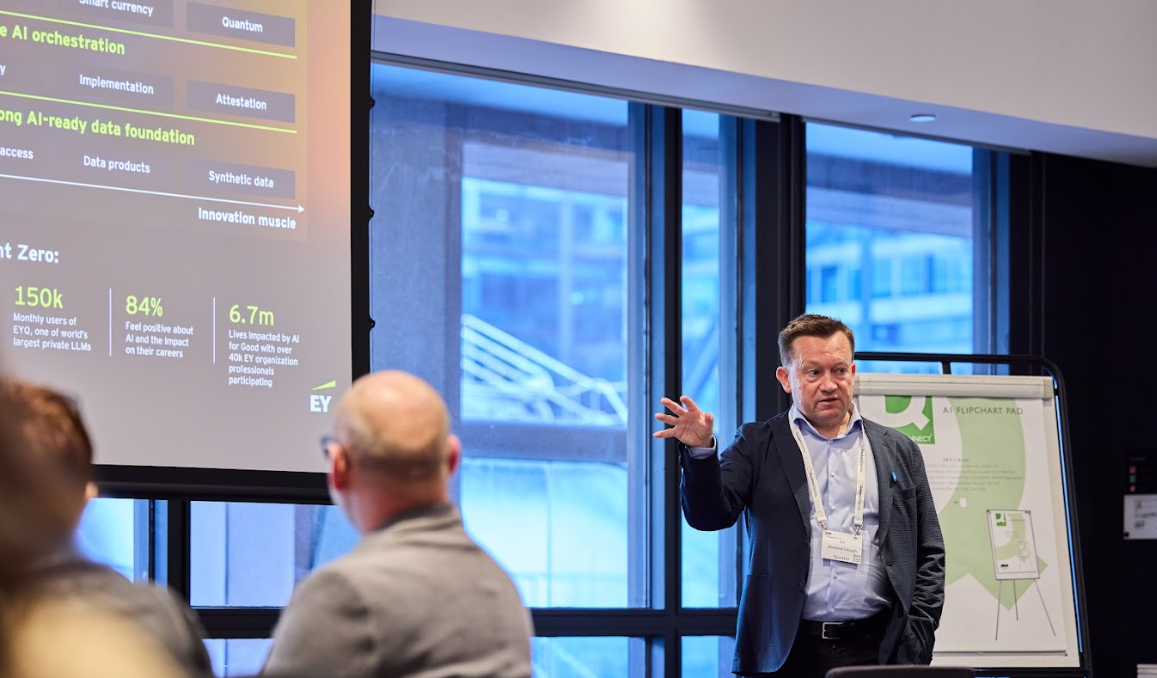 Speaker leading a presentation session at the Momentum AI London conference.