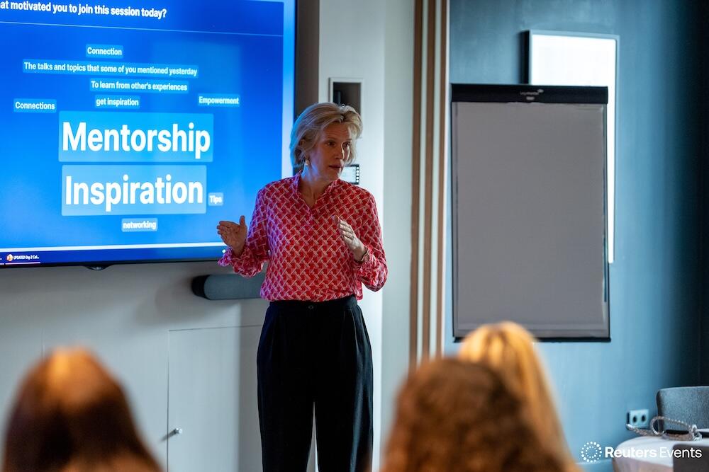 A photo of a speaker on stage at the The Future of Insurance USA event