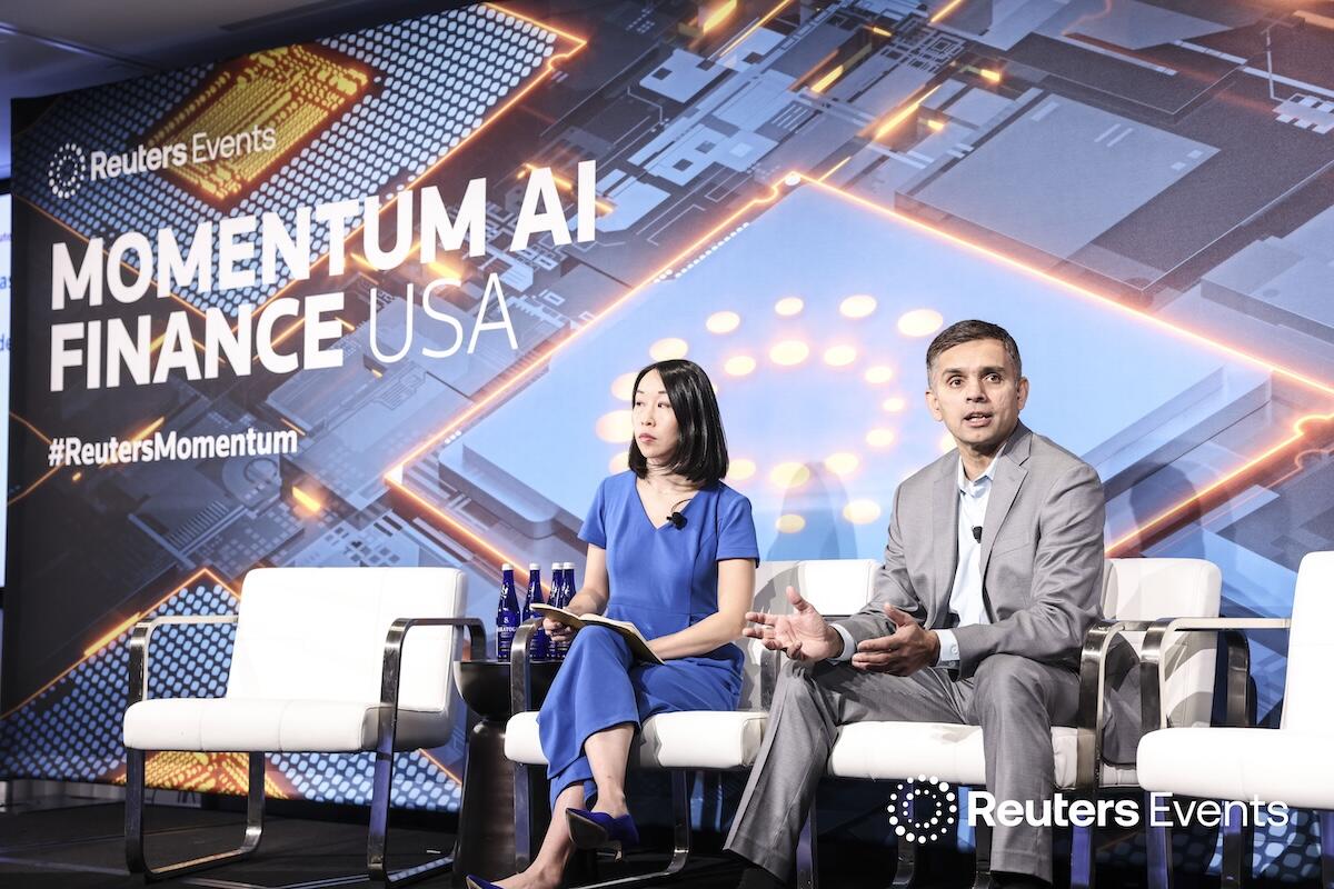 Two speakers on stage at the Momentum AI Finance USA Event