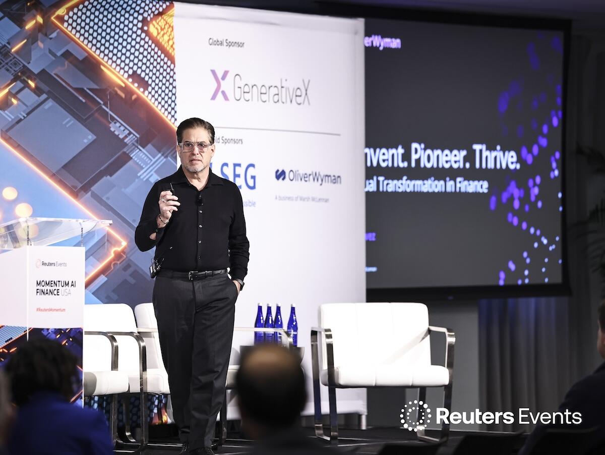 A speaker on stage at the Momentum AI Finance USA Event