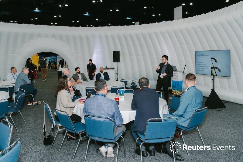 A discussion taking place in what seems to be a igloo type room