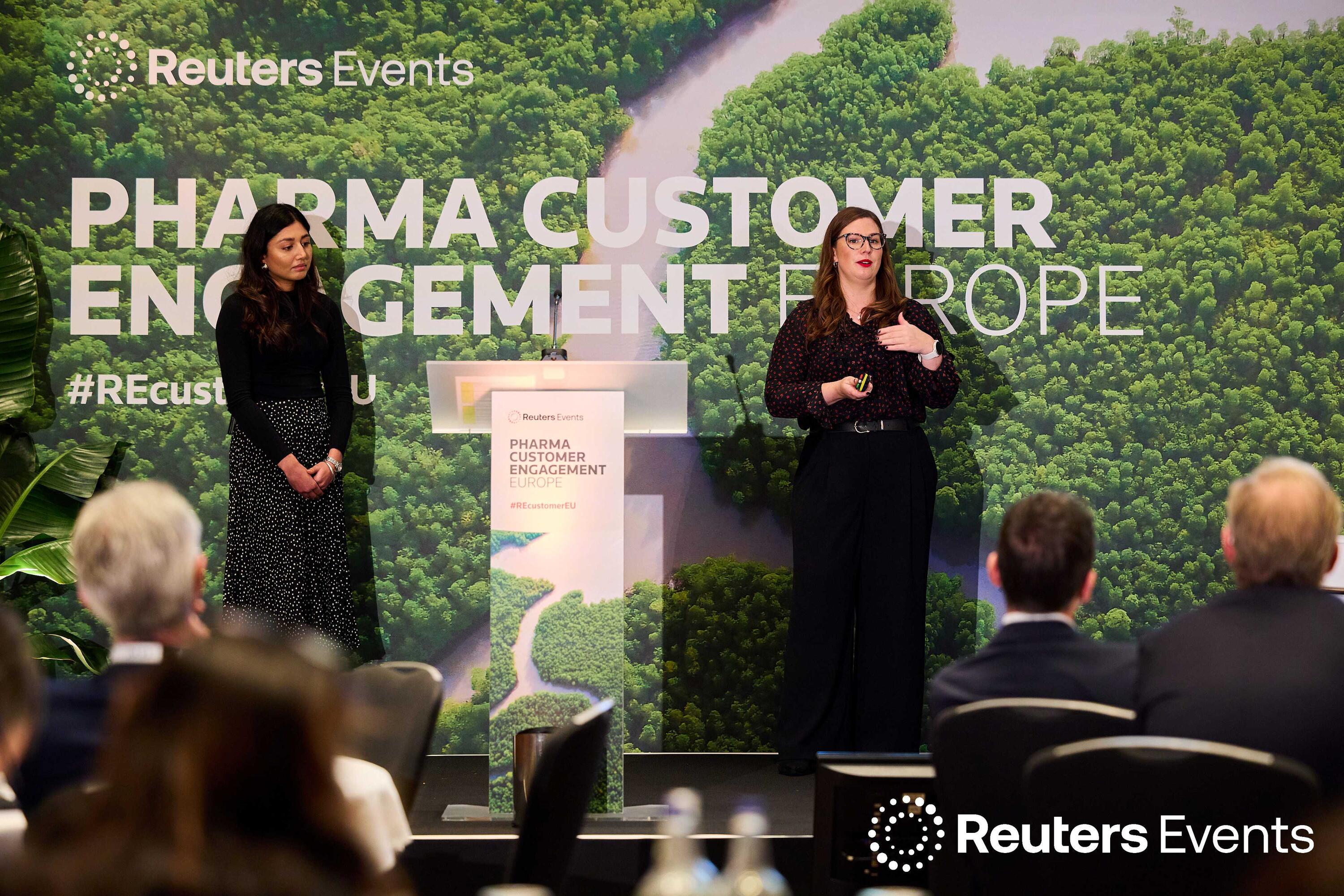 2 panellists onstage at Pharma USA