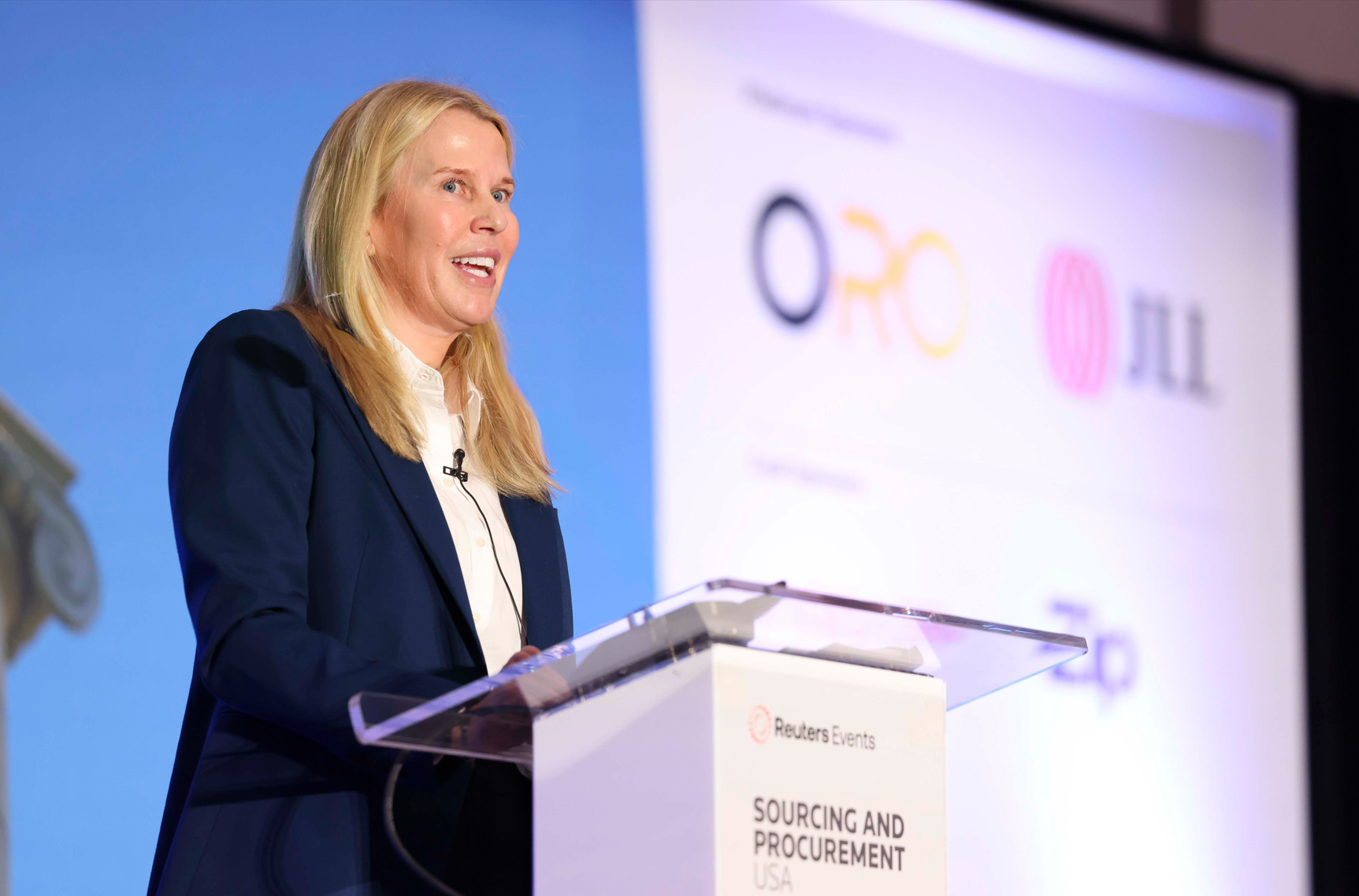 Speaker at a podium at Reuters Events "Sourcing and Procurement USA."