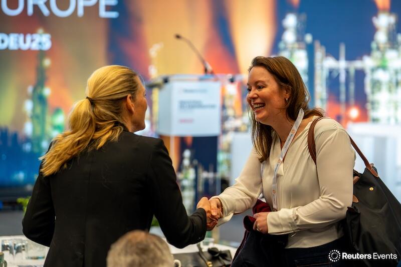 Two people shaking hands at our event