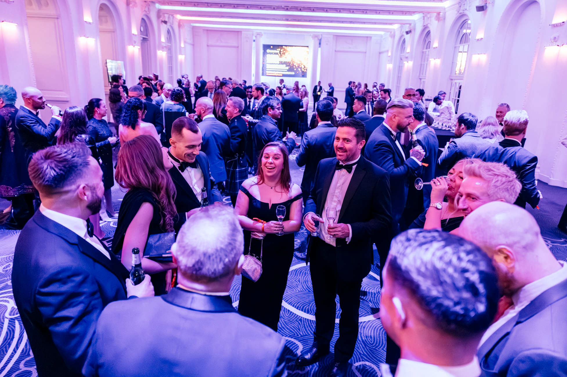 Guests seated at a dinner table talking and laughing during the Global Energy Transition Awards 2025.
