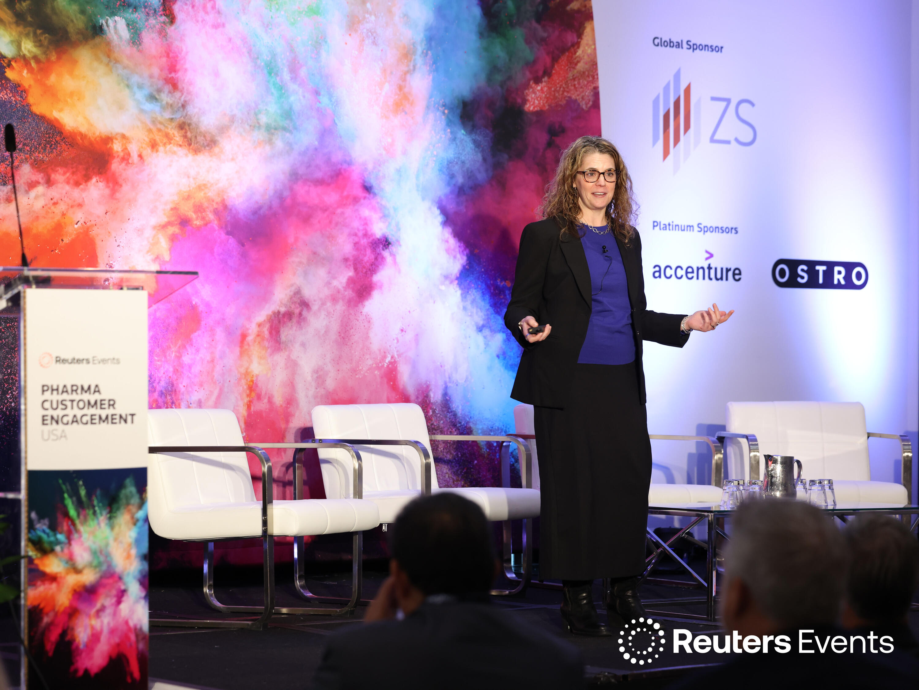 Speaker onstage at Pharma Customer Engagement USA