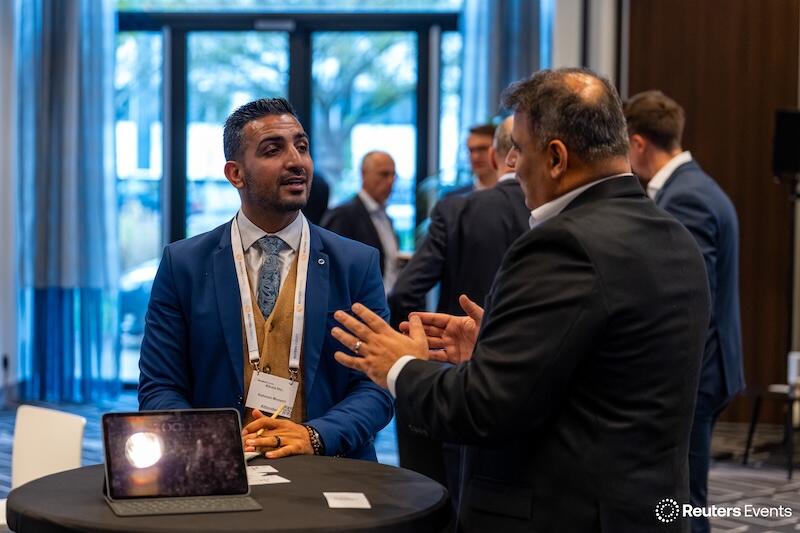 Two people networking at a break out area at Supply Chain Europe 2025