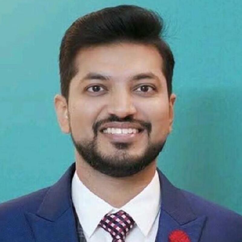 Headshot of Aseem Sainudheen