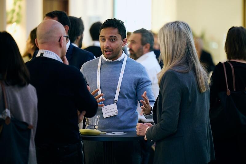 Three people talking in the networking hall