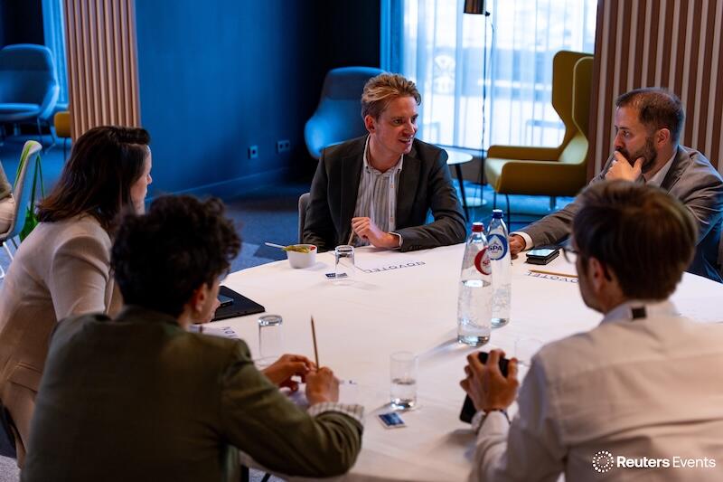 A group roundtable discussion taking place