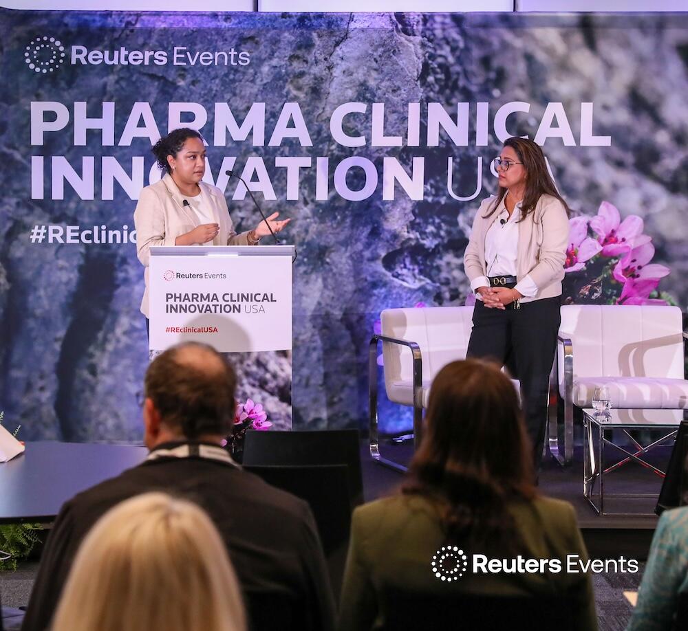 2 people on stage at our Pharma Customer Engagement USA show talking about R and D revolution