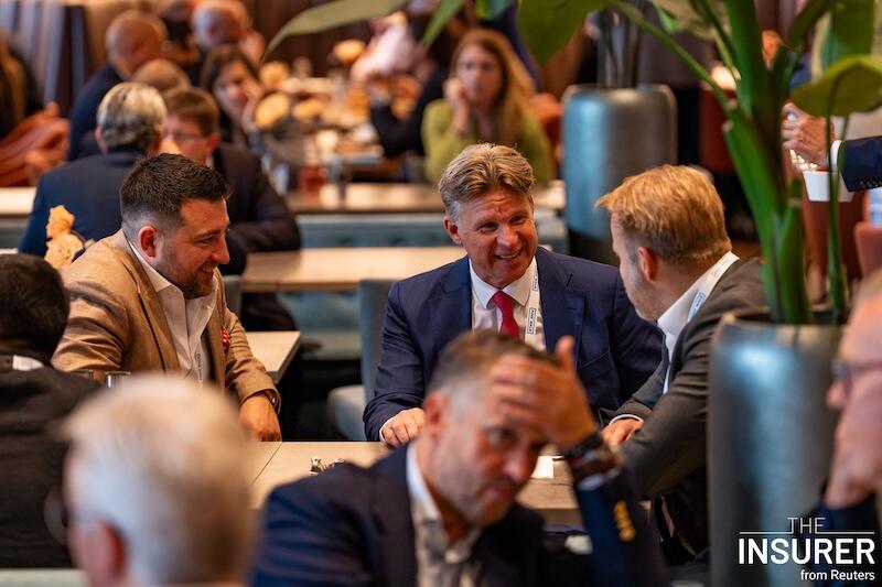 Thee delegates at the MGA summit last year networking over drinks