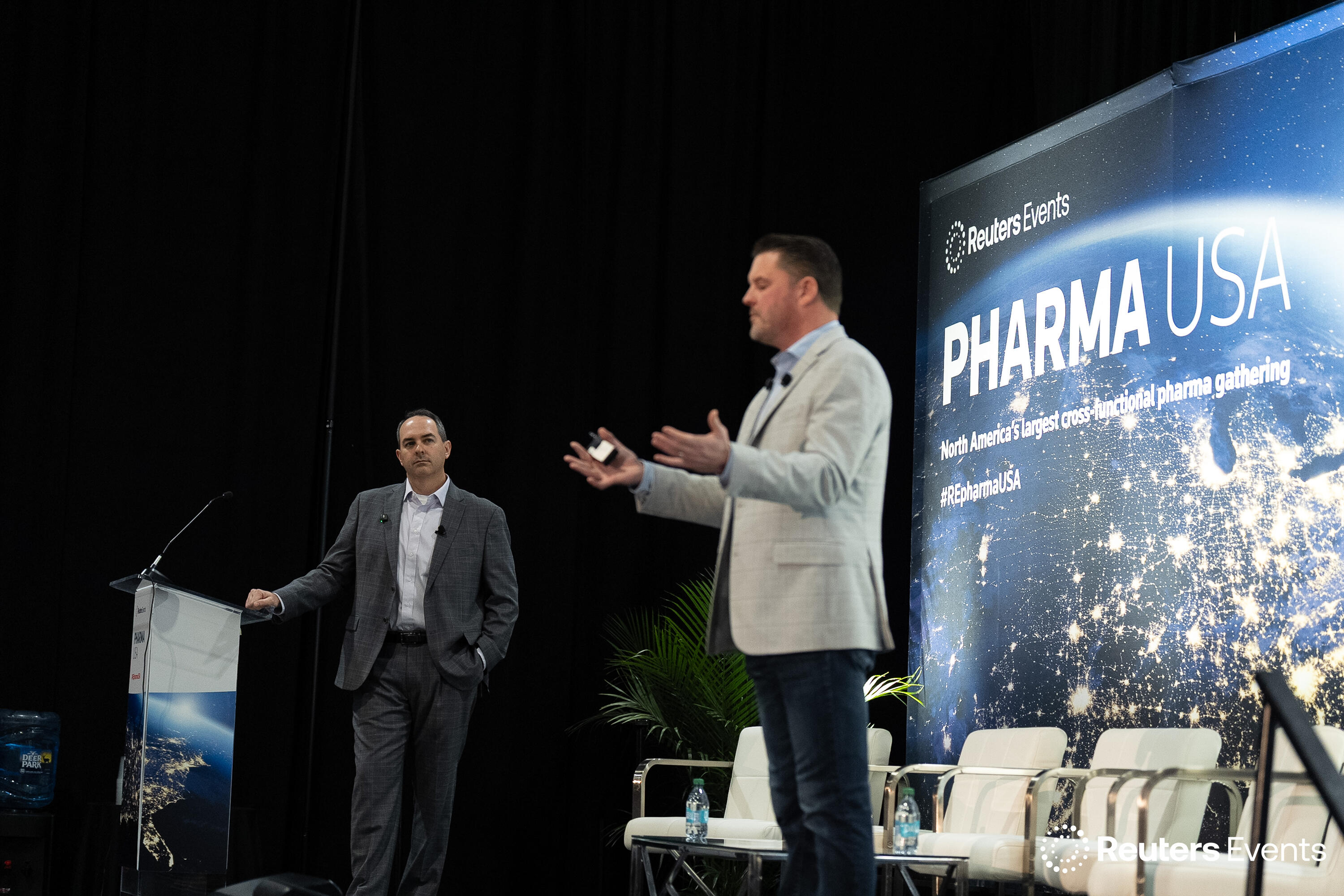 Two speakers on stage at Pharma USA