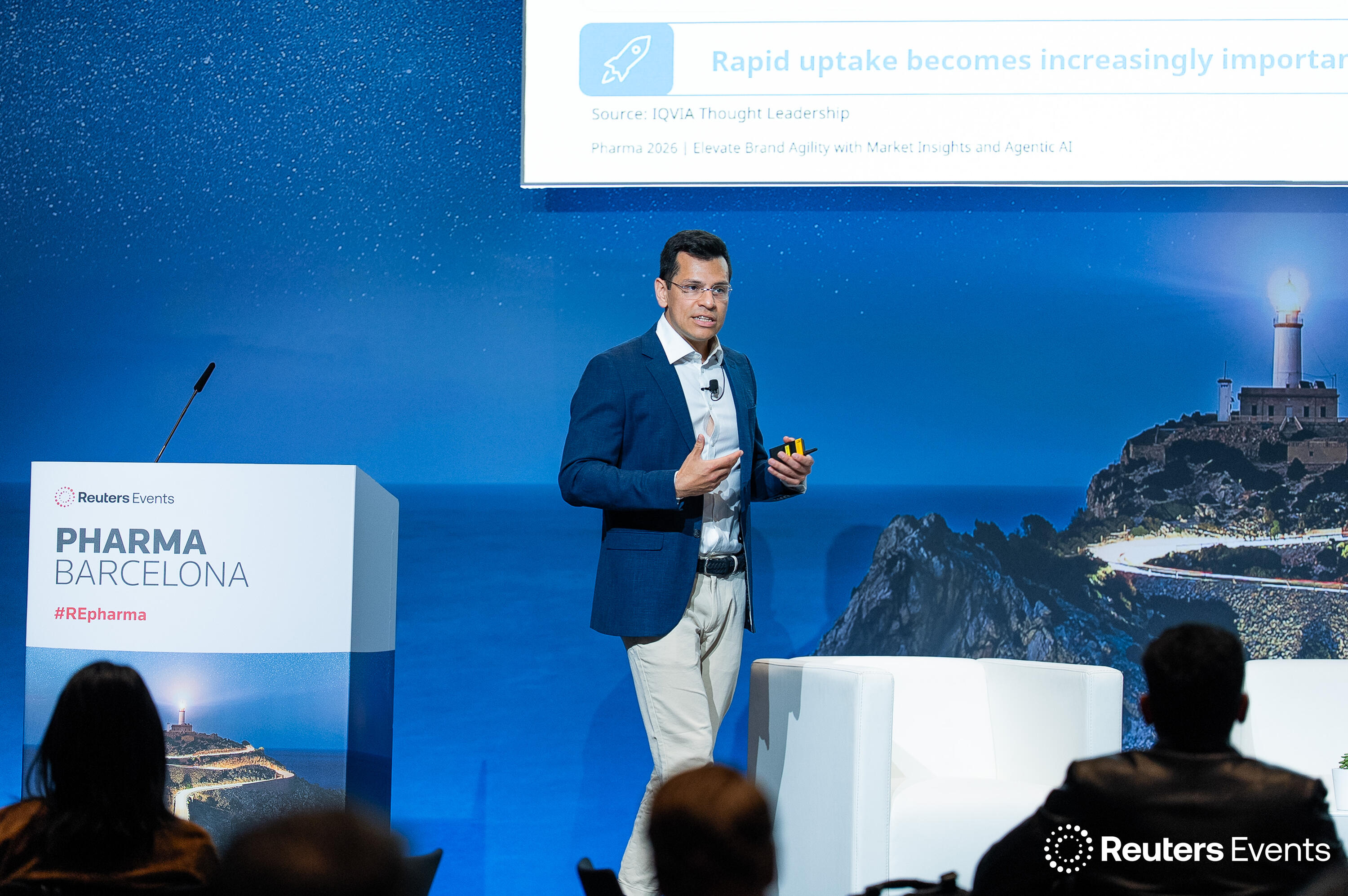 A speaker on stage at Pharma Europe