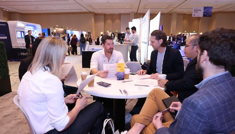 Attendees at a Reuters Event network and share ideas